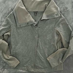 58% cotton, 38% polyester, 4% spandex.
Machine wash cold, dry low.